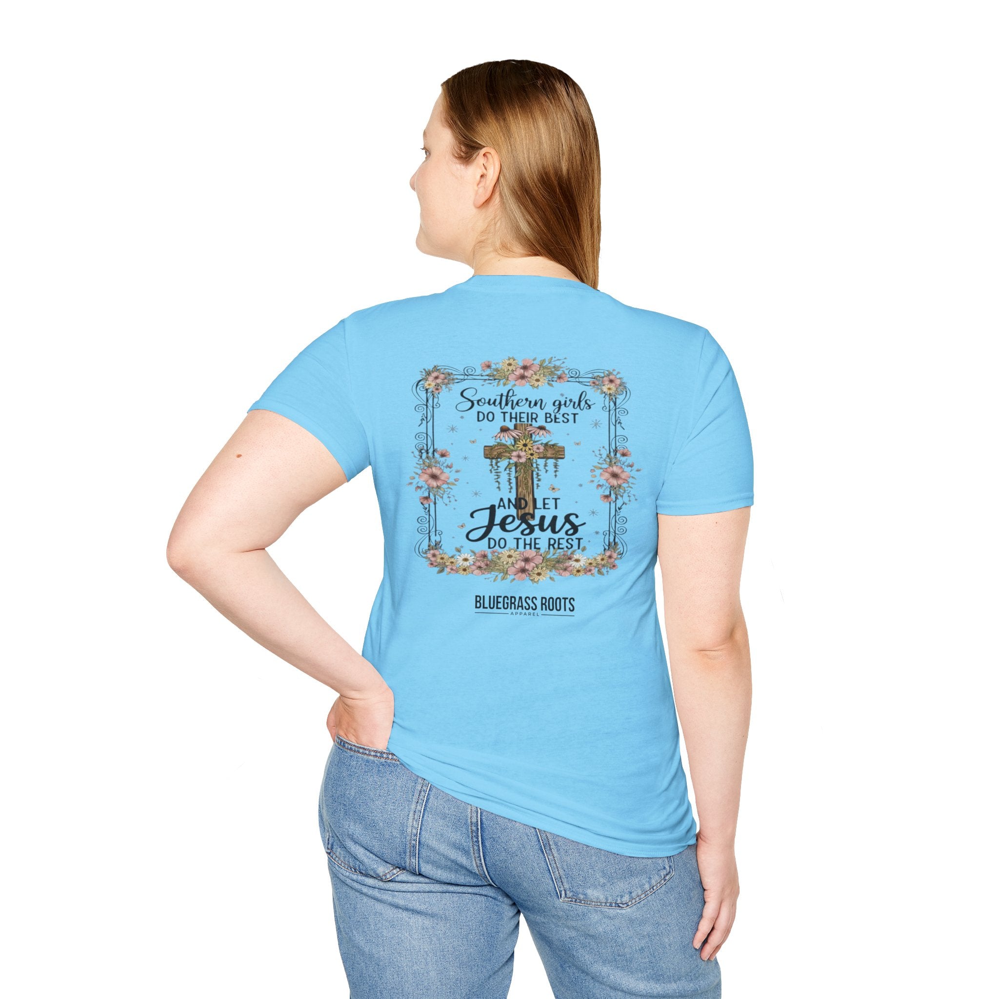 Woman wearing a light blue t-shirt with text and floral design on the back, standing against a white background.