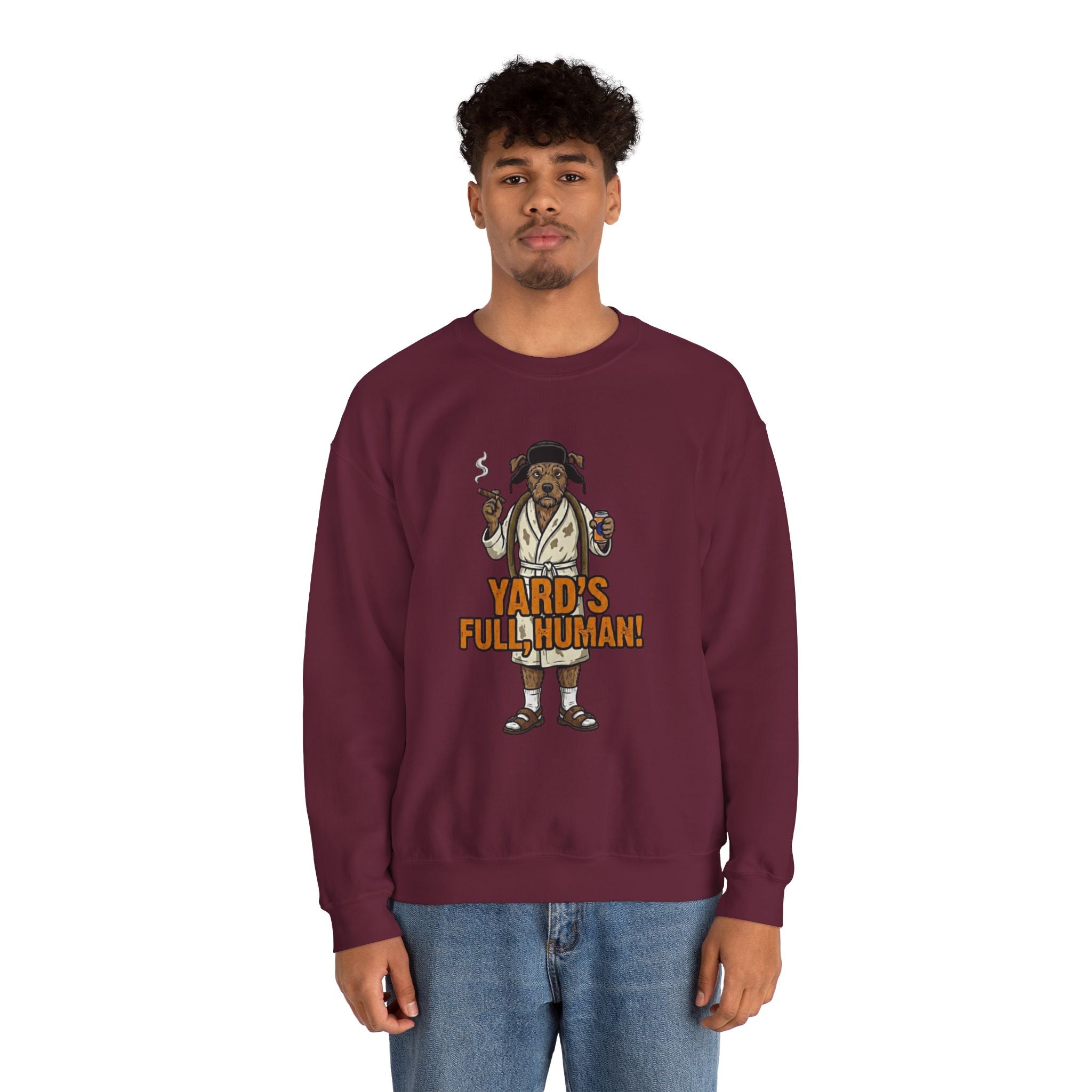 Person wearing a maroon sweatshirt with a graphic design and text on a white background