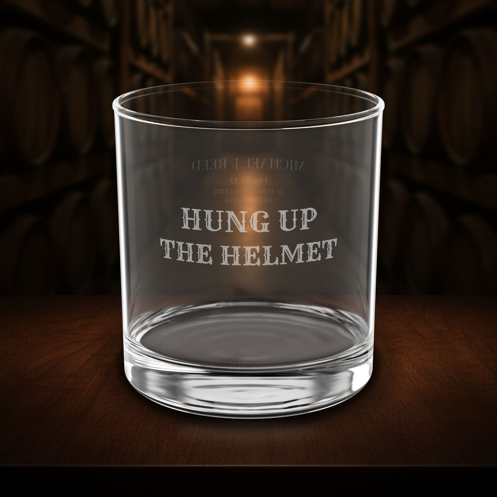 Personalized Firefighter Gift — front view of the engraved design, shot in a bourbon barrel warehouse — 10.5 oz engraved whiskey glass by Bluegrass Gifts