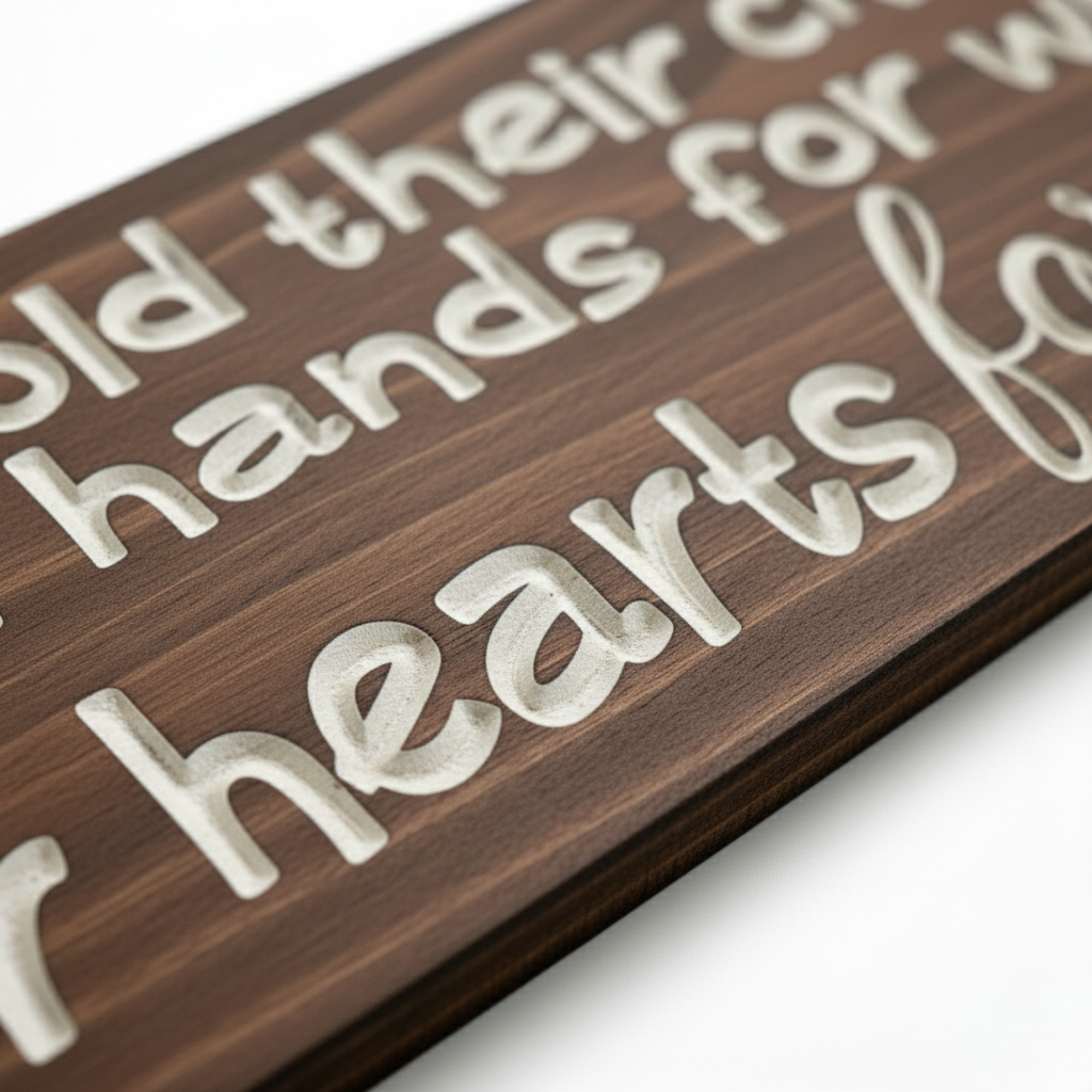 Close-up detail of precision CNC carving on solid hardwood showing 3D depth and natural wood grain contrast.