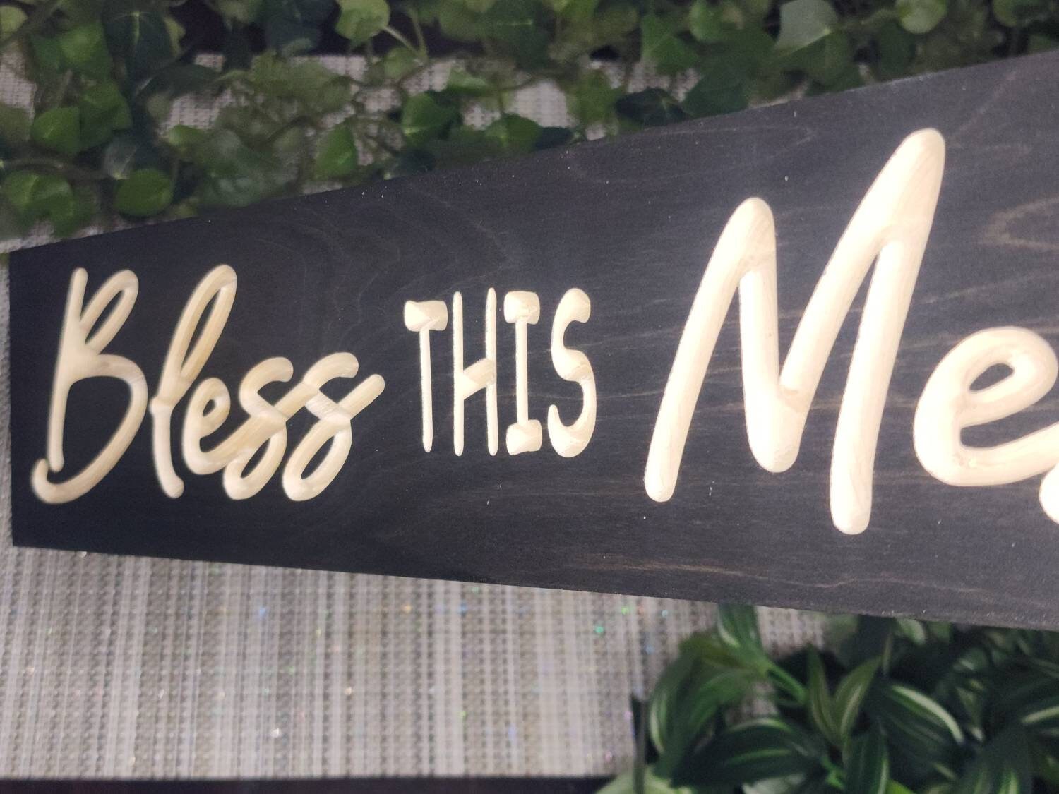 Decorative farmhouse wall art with a charming and relatable sentiment.