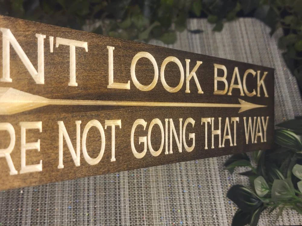 Decorative wooden sign with a positive affirmation in a wellness room for encouragement.