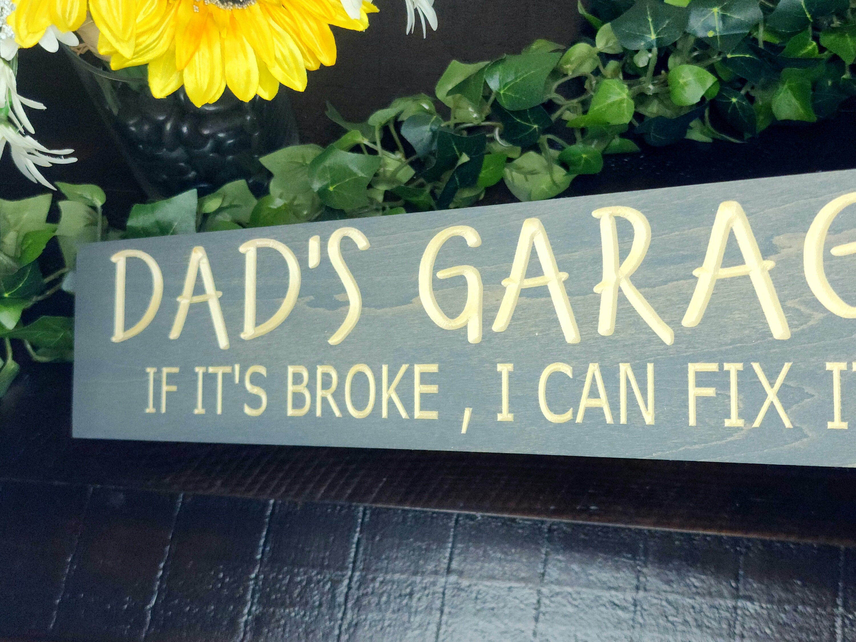 Funny Father’s Day gift with humorous garage wall art for dad’s workspace.