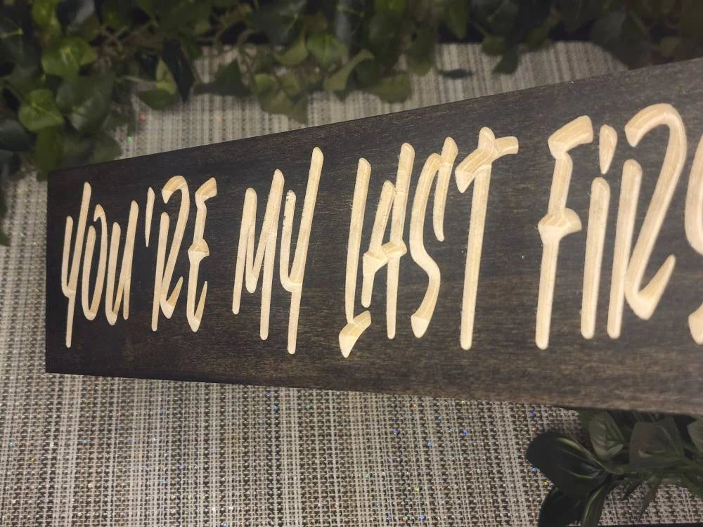 Heartfelt Last First Kiss plaque for anniversaries and vow renewal decor.