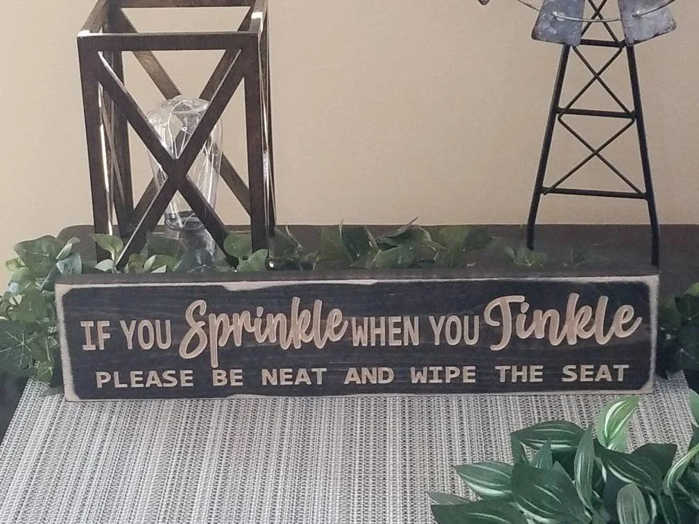 Humorous bathroom reminder sign with rhyming quote for unique bathroom wall art.