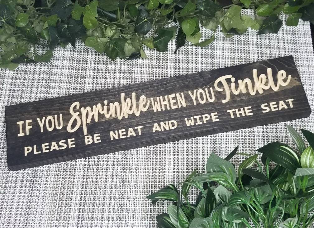 If You Sprinkle When You Tinkle wood sign for funny bathroom etiquette decor.