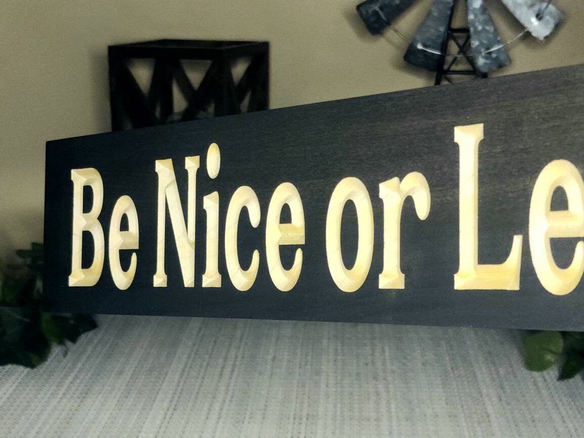 Modern wall sign with bold lettering for home decor or guest room wall art.