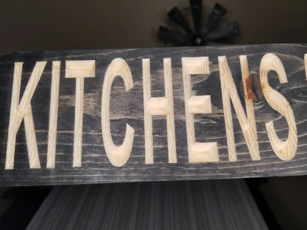 Personalized kitchen wall decor with a heartwarming family quote.