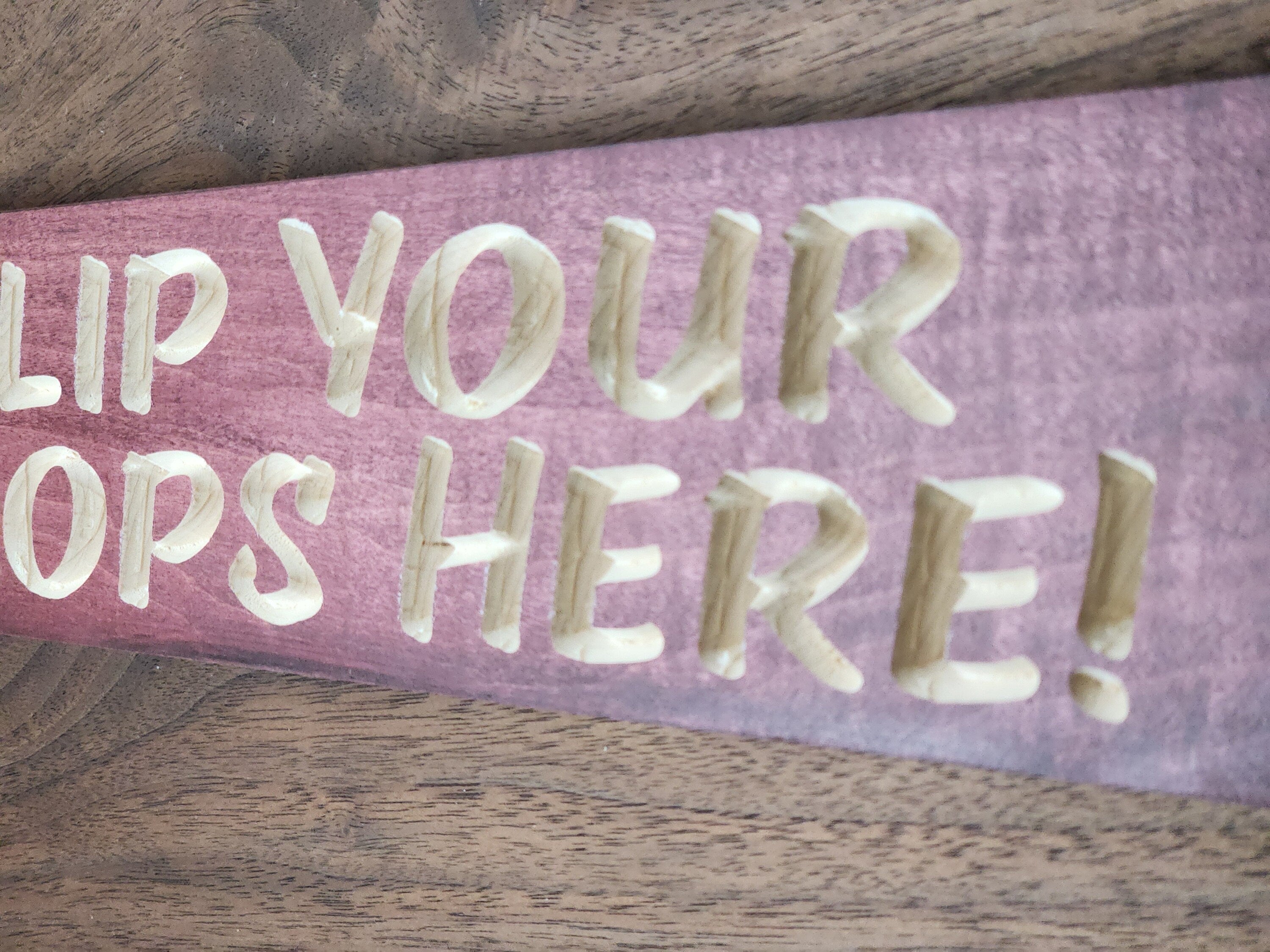 Practical outdoor hanging sign with a playful vibe for porch and pool areas.