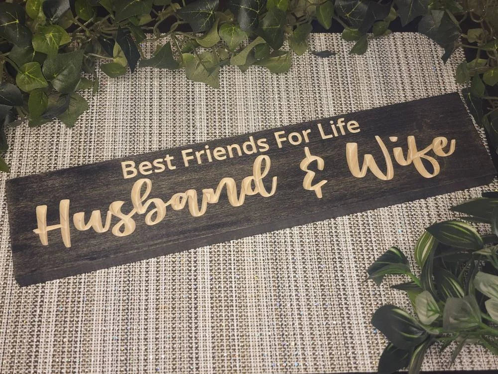 Romantic wooden sign reading "Best Friends for Life, Husband and Wife" displayed in a cozy bedroom setting.