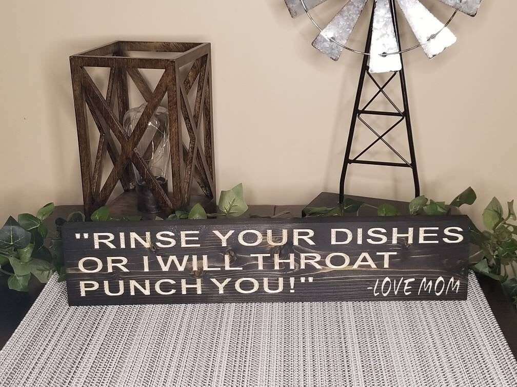 Sarcastic mom quote sign for kitchen humor and dishwashing reminders.
