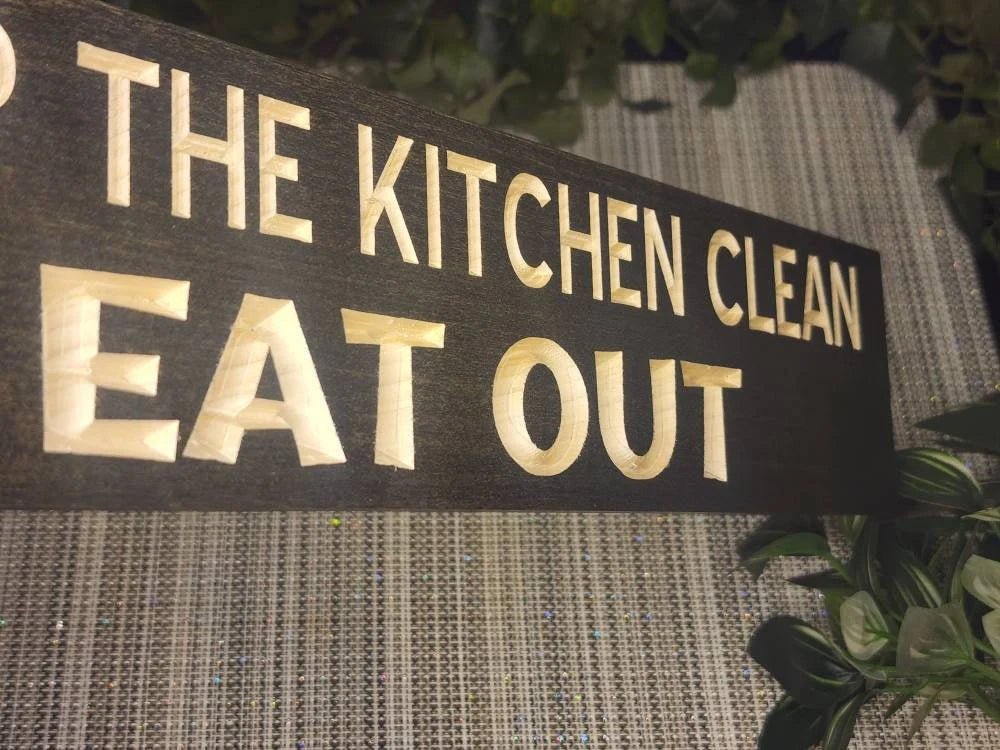 Witty dining humor sign for kitchen or dining room wall decor with a playful tone.