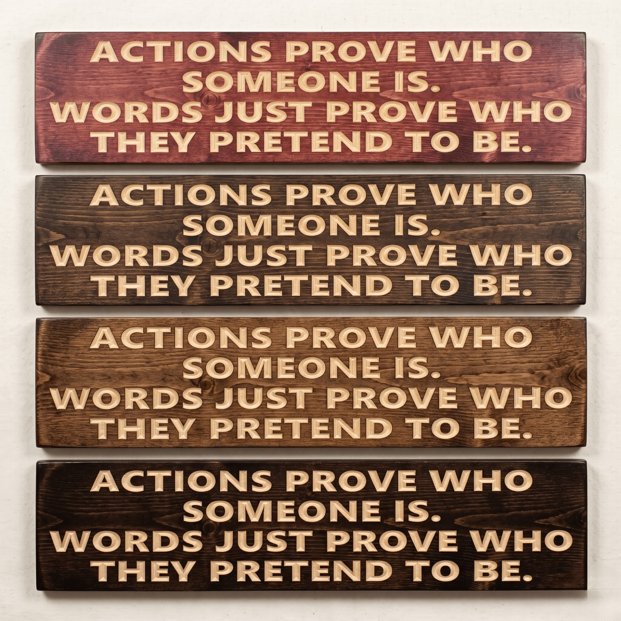 Motivational wood sign reading "Actions Prove Who Someone Is, Words Just Prove Who They Pretend to Be" shown in four stain finish options including cabernet, dark walnut, early American, and ebony — CNC carved rustic wall art from Bluegrass Gifts.