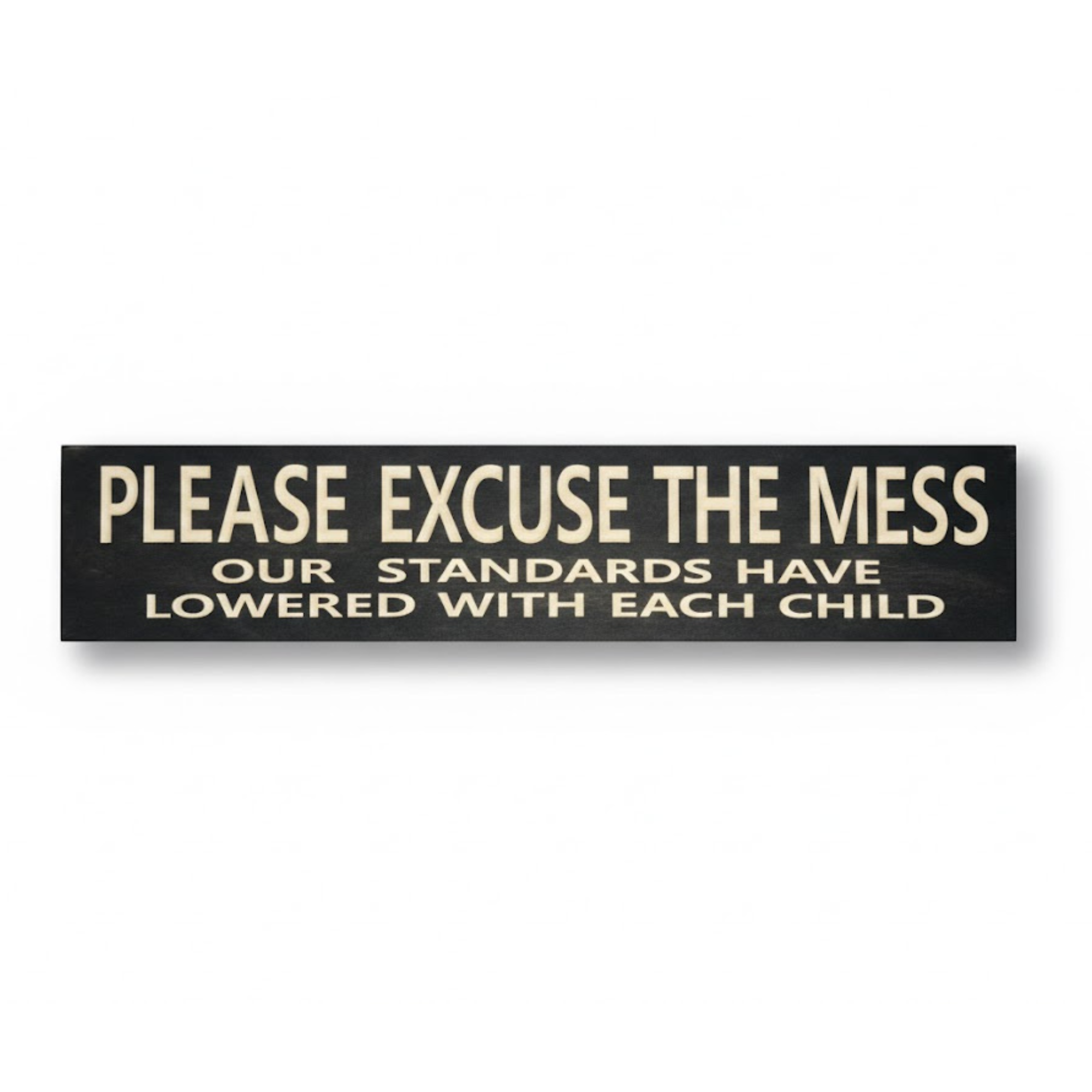 Hand-carved solid wood sign by Bluegrass Gifts featuring the quote "Please Excuse the Mess Our Standards Have Lowered With Each Child" in cream letters on black stain.