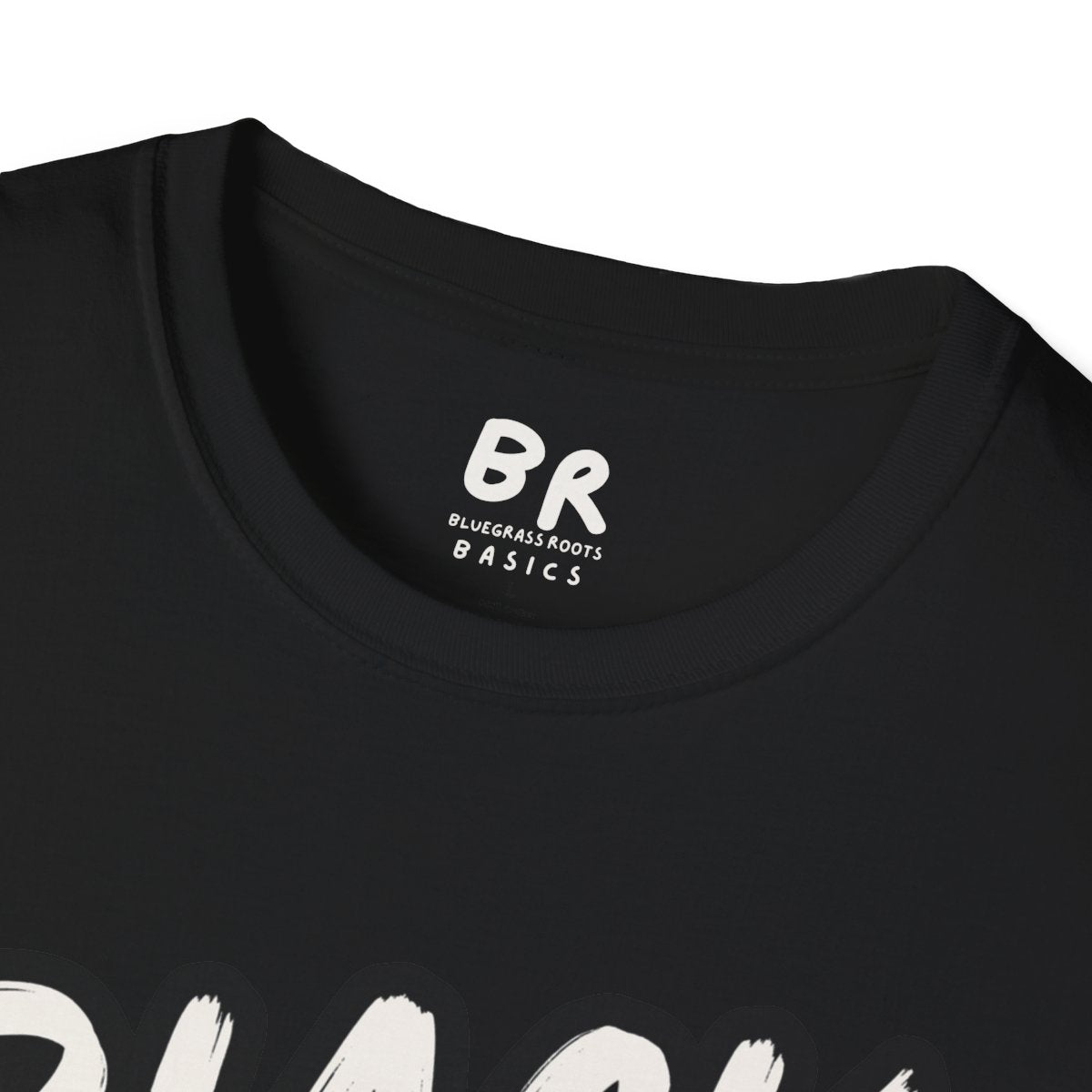 Close-up of the collar of a black tee, showing the Bluegrass Roots Basics brand tag on the Cattle Shirt - Black Baldy
