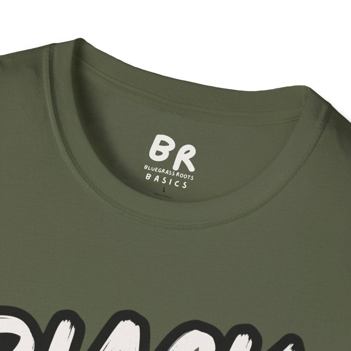 Close-up of the collar of an olive green tee, showing the Bluegrass Roots Basics tag above the "Cattle Shirt - Black Baldy" graphic