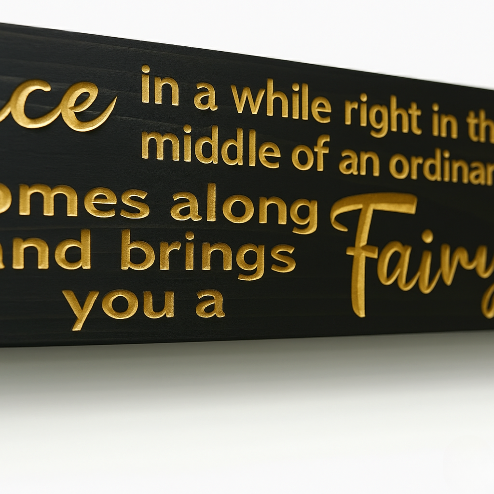 Close-up of CNC-carved lettering on solid wood — “Once in a while love brings you a fairy tale” engraved detail showcasing authentic craftsmanship and texture.