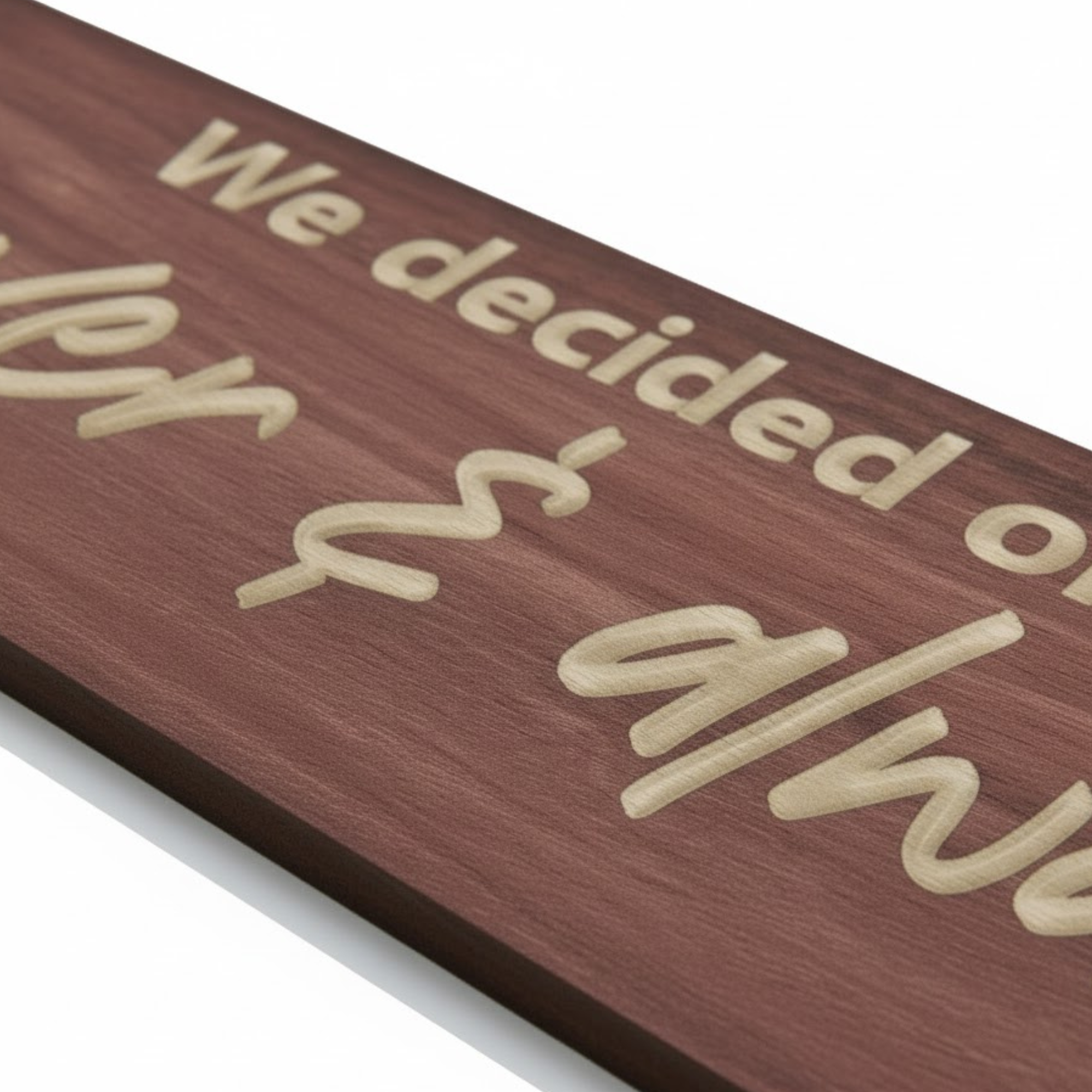 Close-up of engraved “Forever & Always” wood lettering showing carved detail