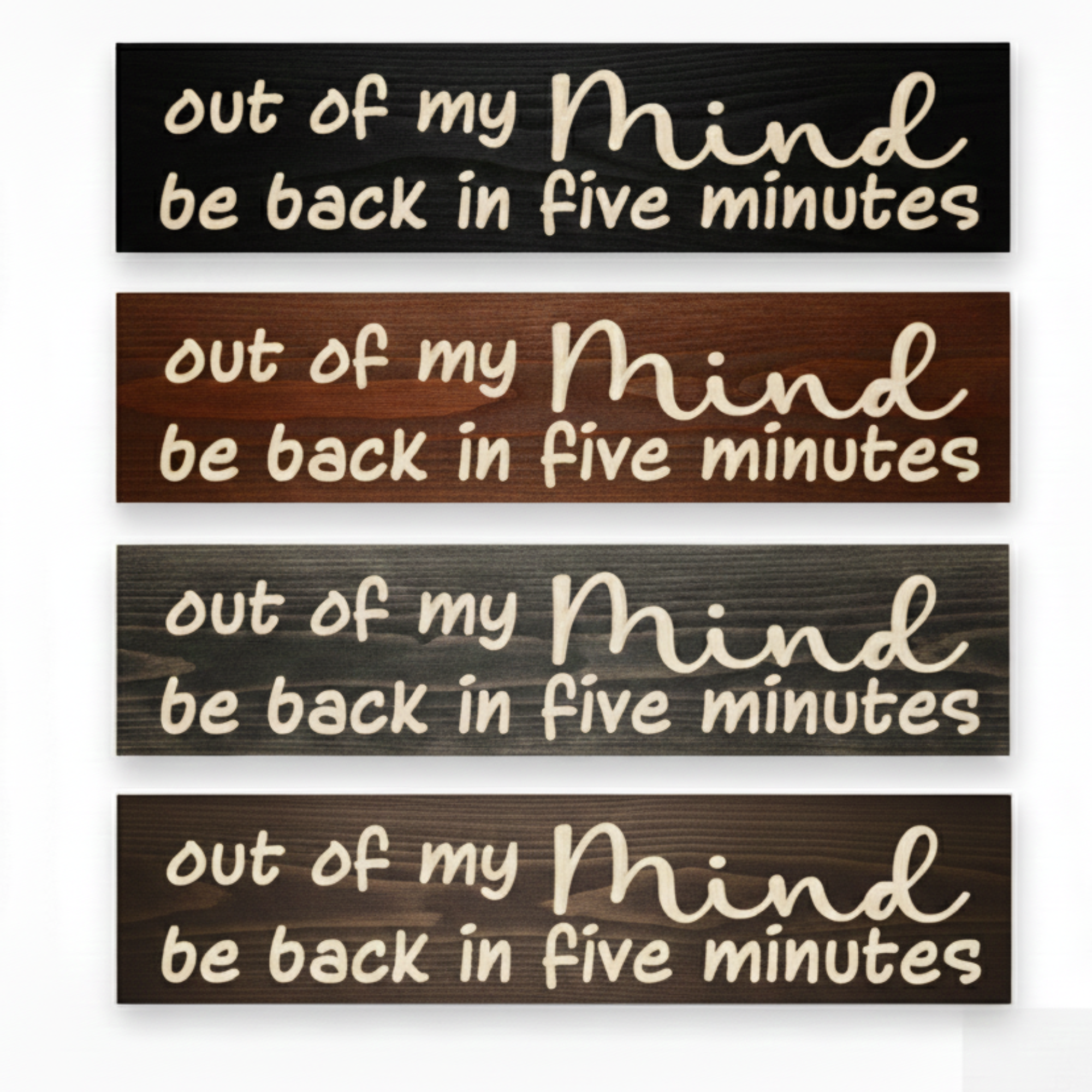Four "Out of My Mind" signs displayed in different finishes including Ebony, Dark Walnut, Weathered Gray, and Barn Red.