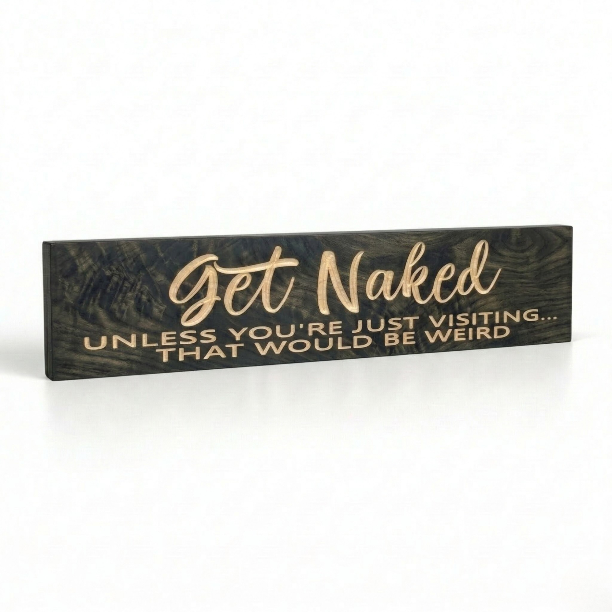 Angled side view of "Get Naked Unless You're Just Visiting" CNC-carved wooden bathroom sign in ebony finish showing 3D carving depth – Bluegrass Gifts