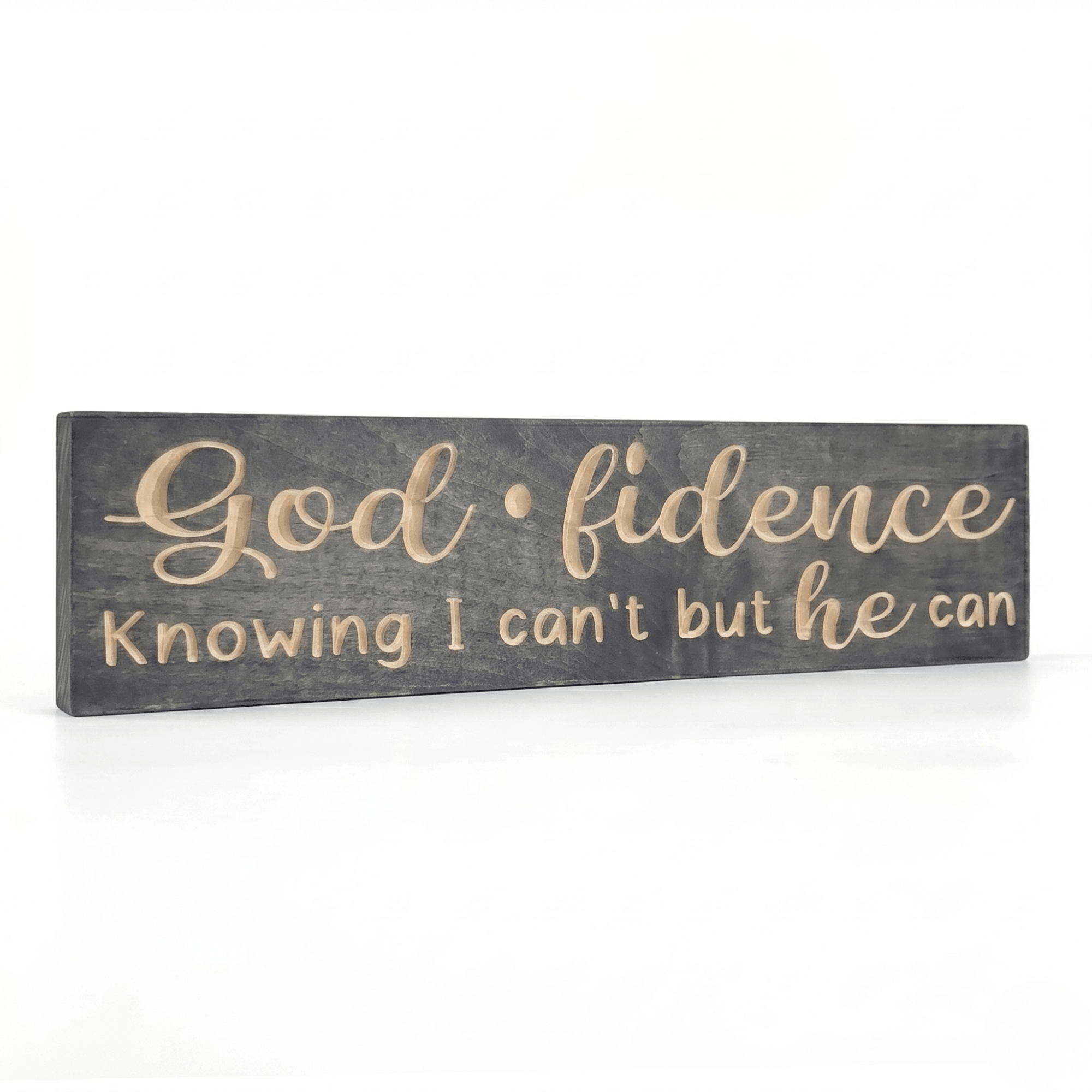 Angled view of the Godfidence wooden faith sign showcasing the dimensional depth of CNC-carved lettering against a gray-stained solid wood background