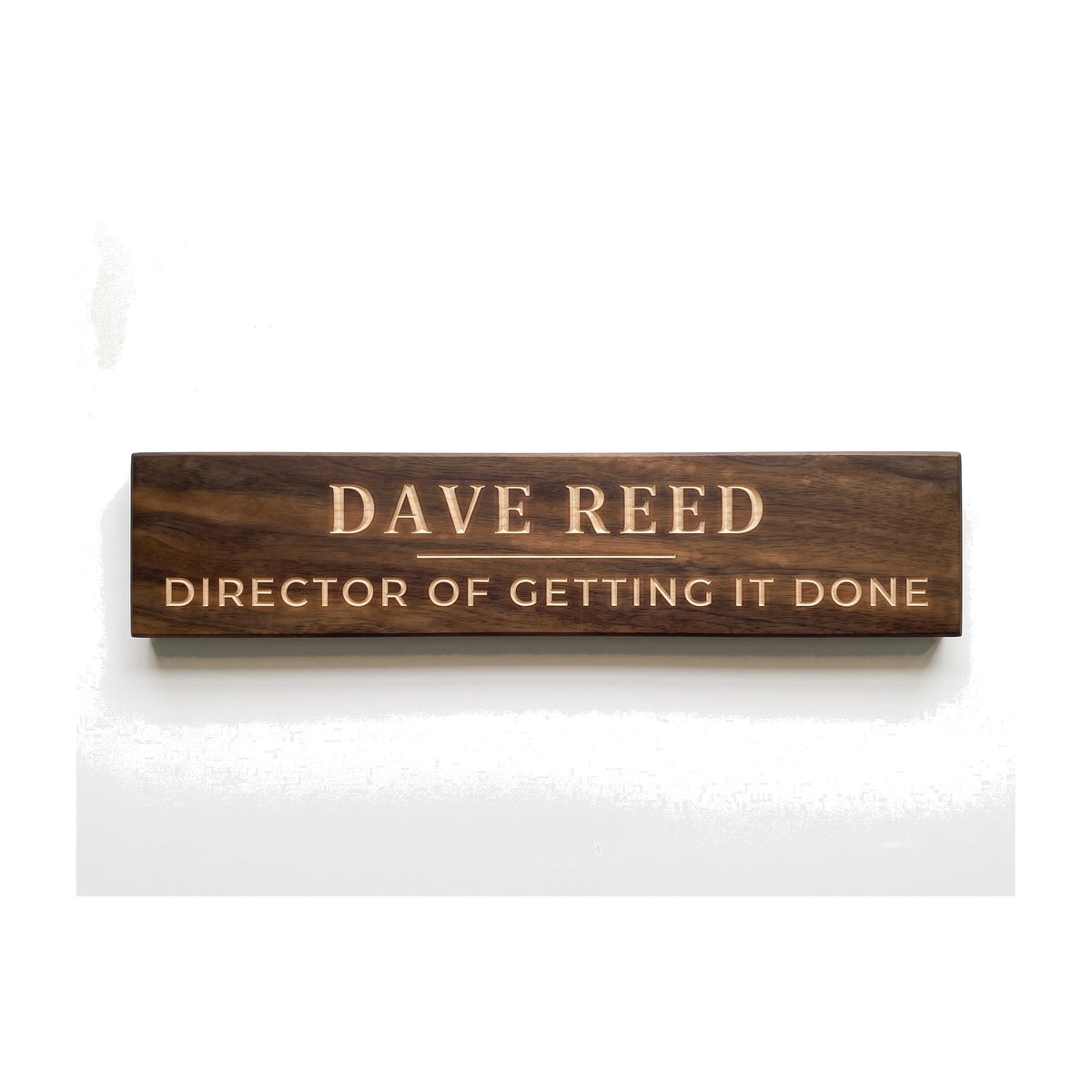 Personalized Dave Reed sign carved into solid wood in a Dark Walnut finish, straight on, on a white background (studio photo)