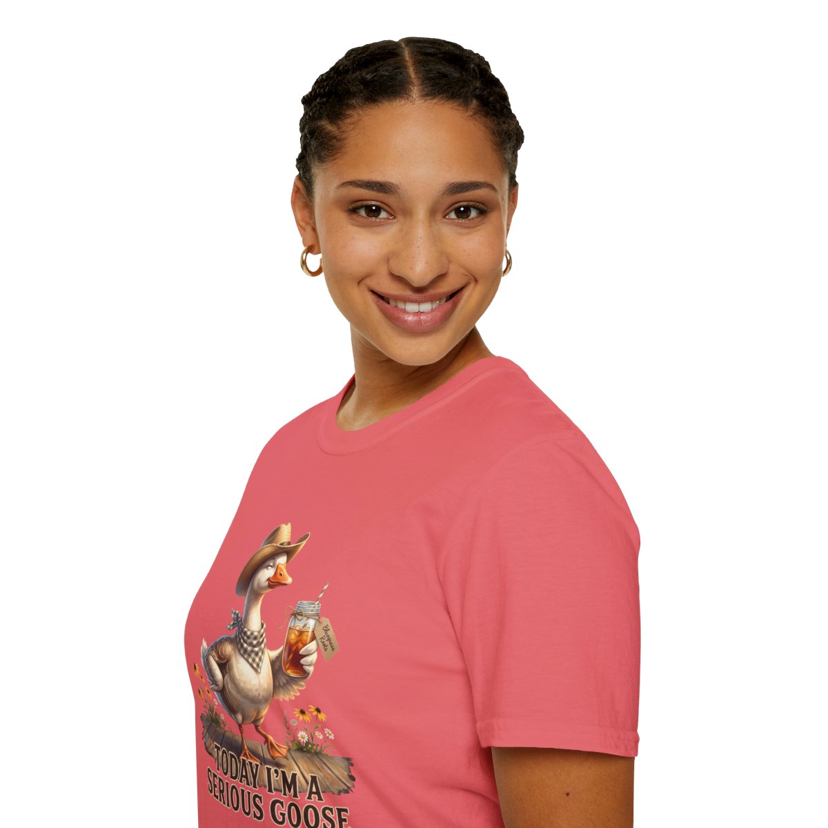 A woman in a coral "Sweet Tea Shirt - Today I'm a Serious Goose" tee, smiling and looking forward, shown from a side angle