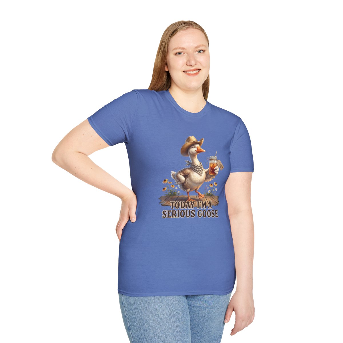 A woman standing with her hand on her hip, wearing a blue Sweet Tea Shirt - Today I'm a Serious Goose, looking forward
