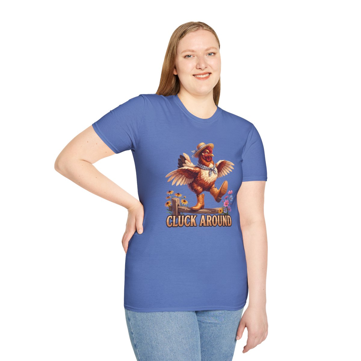 A woman with light hair models the blue Chicken Shirt - Cluck Around, standing with a hand on her hip