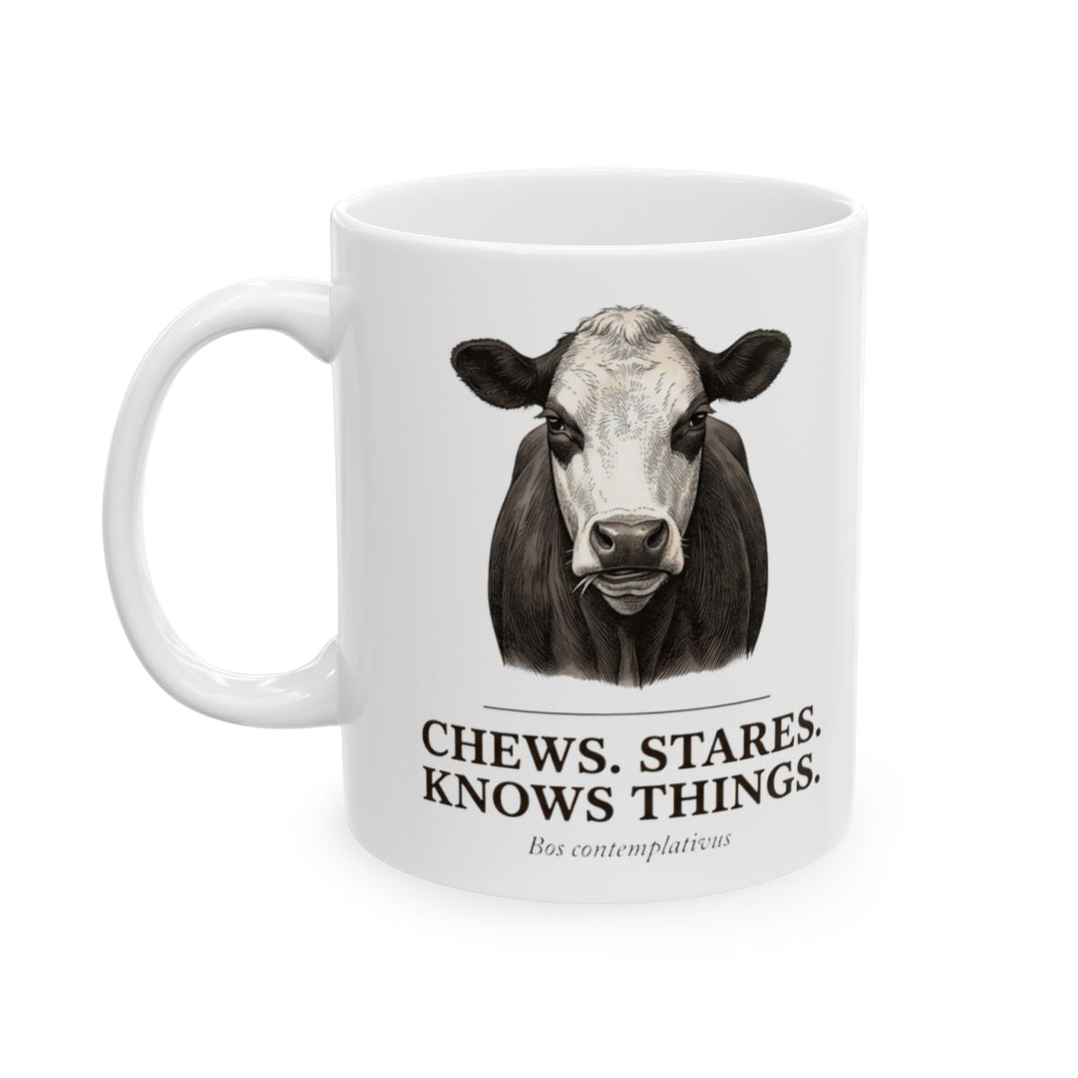 A white Cow Coffee Mug featuring a black and white cow illustration, angled slightly left on a white background from Bluegrass Gifts