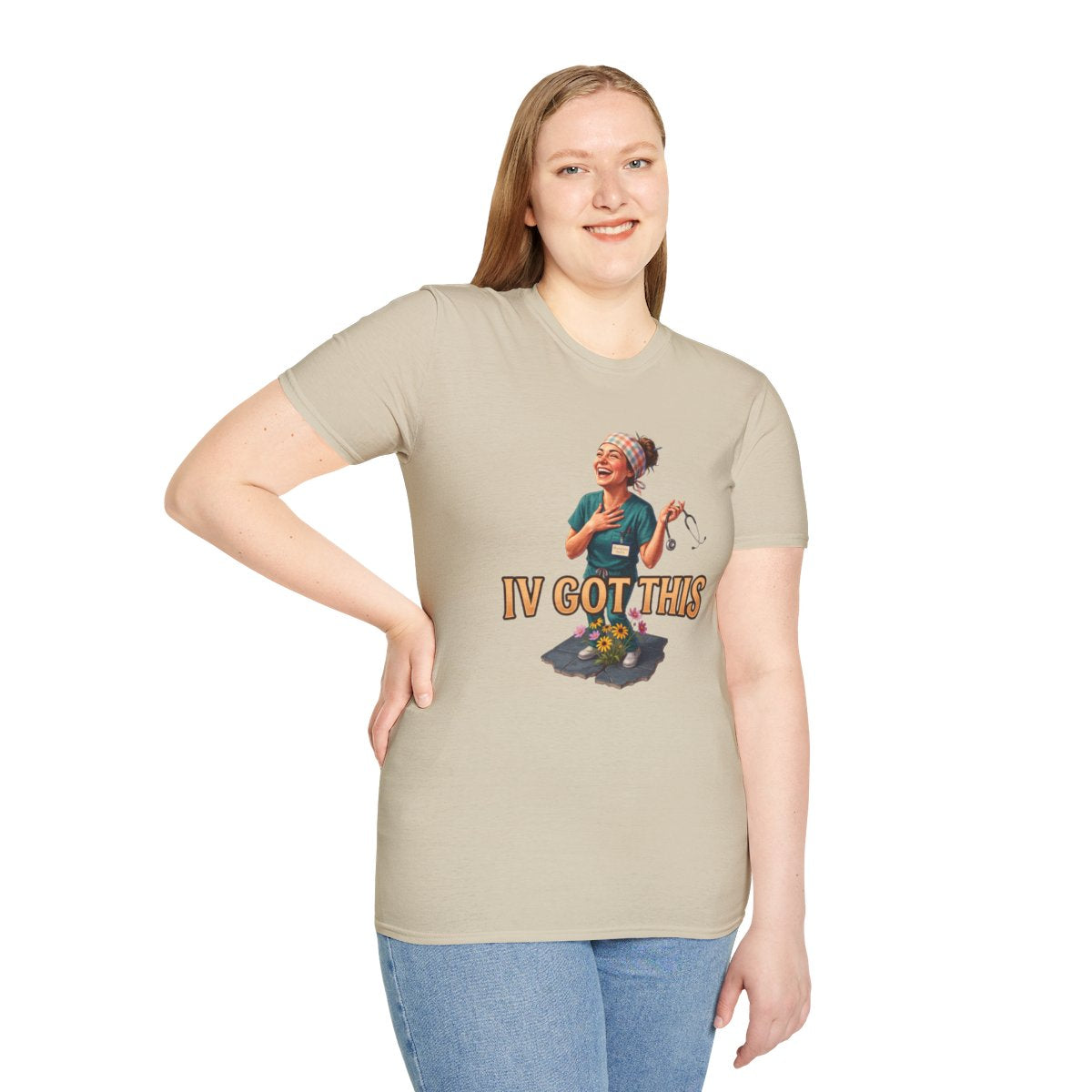 A woman with long blonde hair models the beige Nurse Shirt - IV Got This, standing and smiling at the camera
