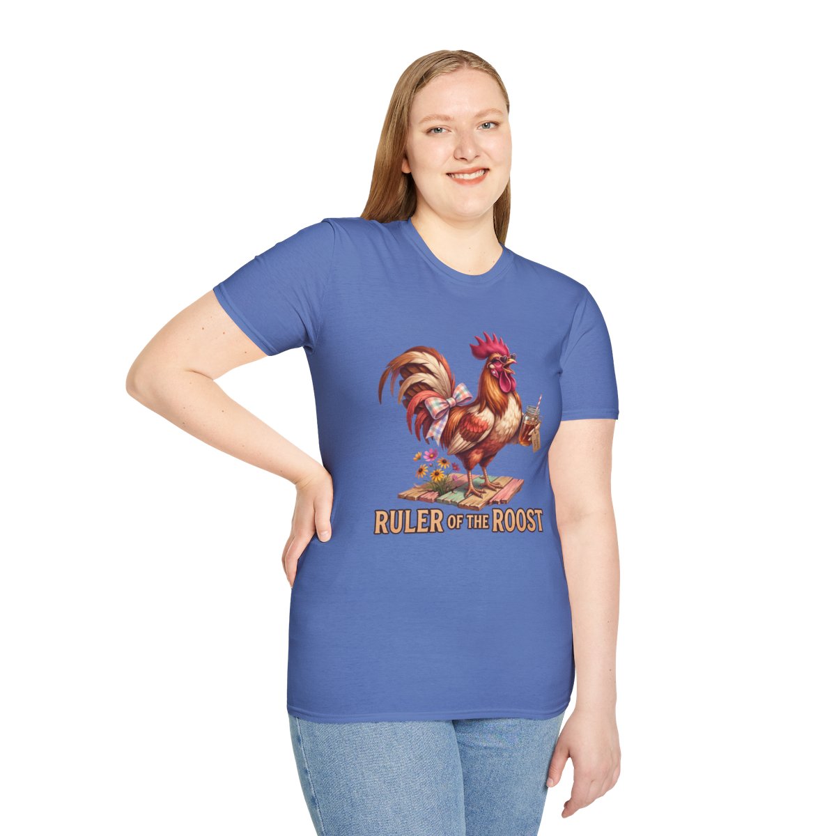 A woman stands smiling, wearing a blue Rooster Shirt - Ruler of the Roost, with her hand on her hip