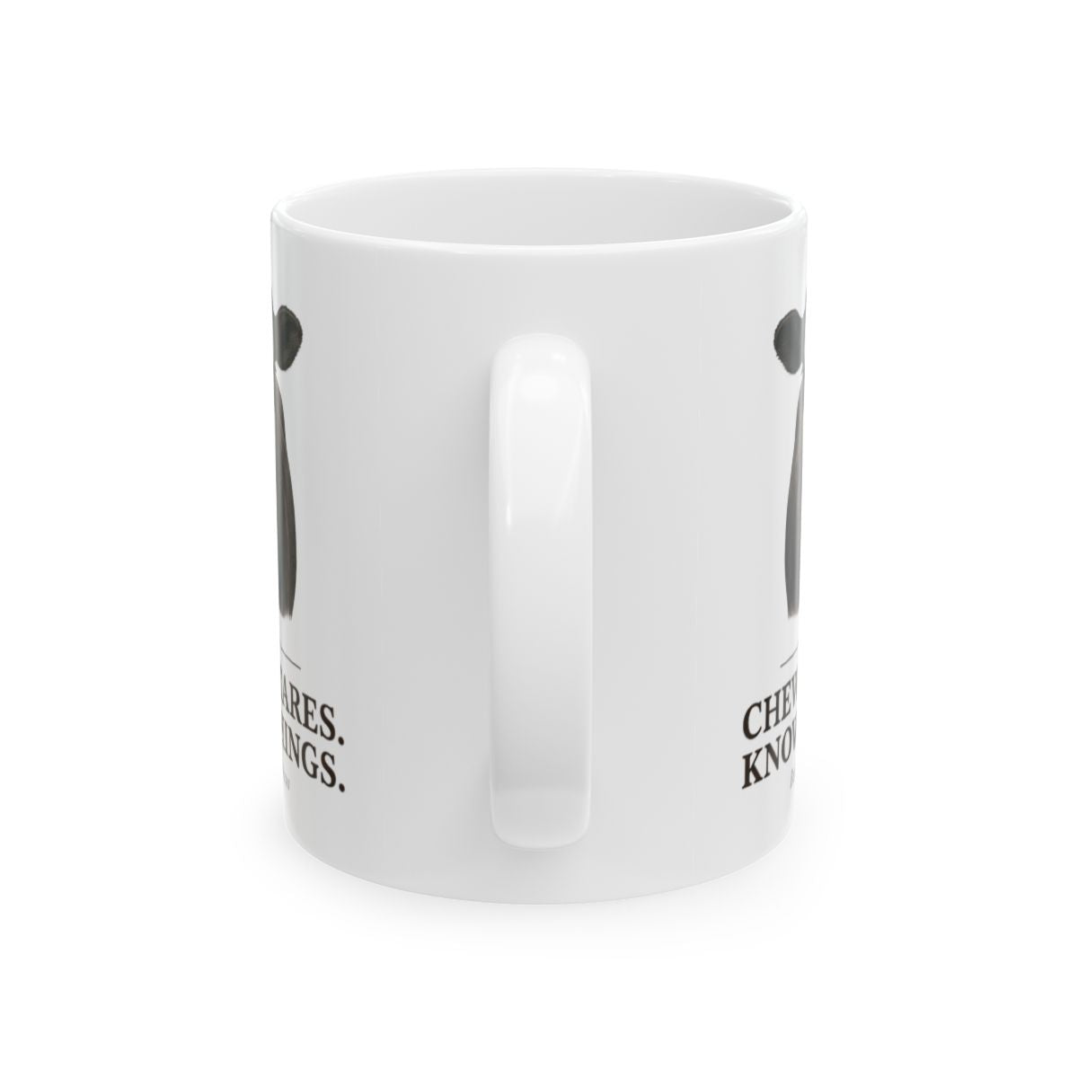 The side view of a white Cow Coffee Mug, showing its handle and partial text on both sides against a plain background