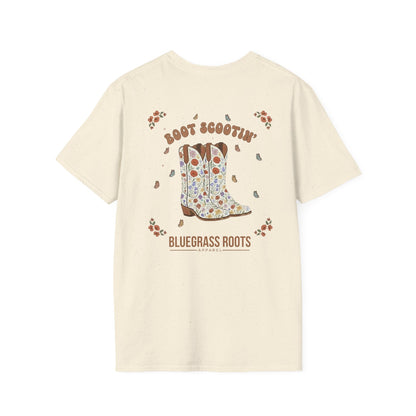 Beige t-shirt with cowboy boot graphic and text on a white background