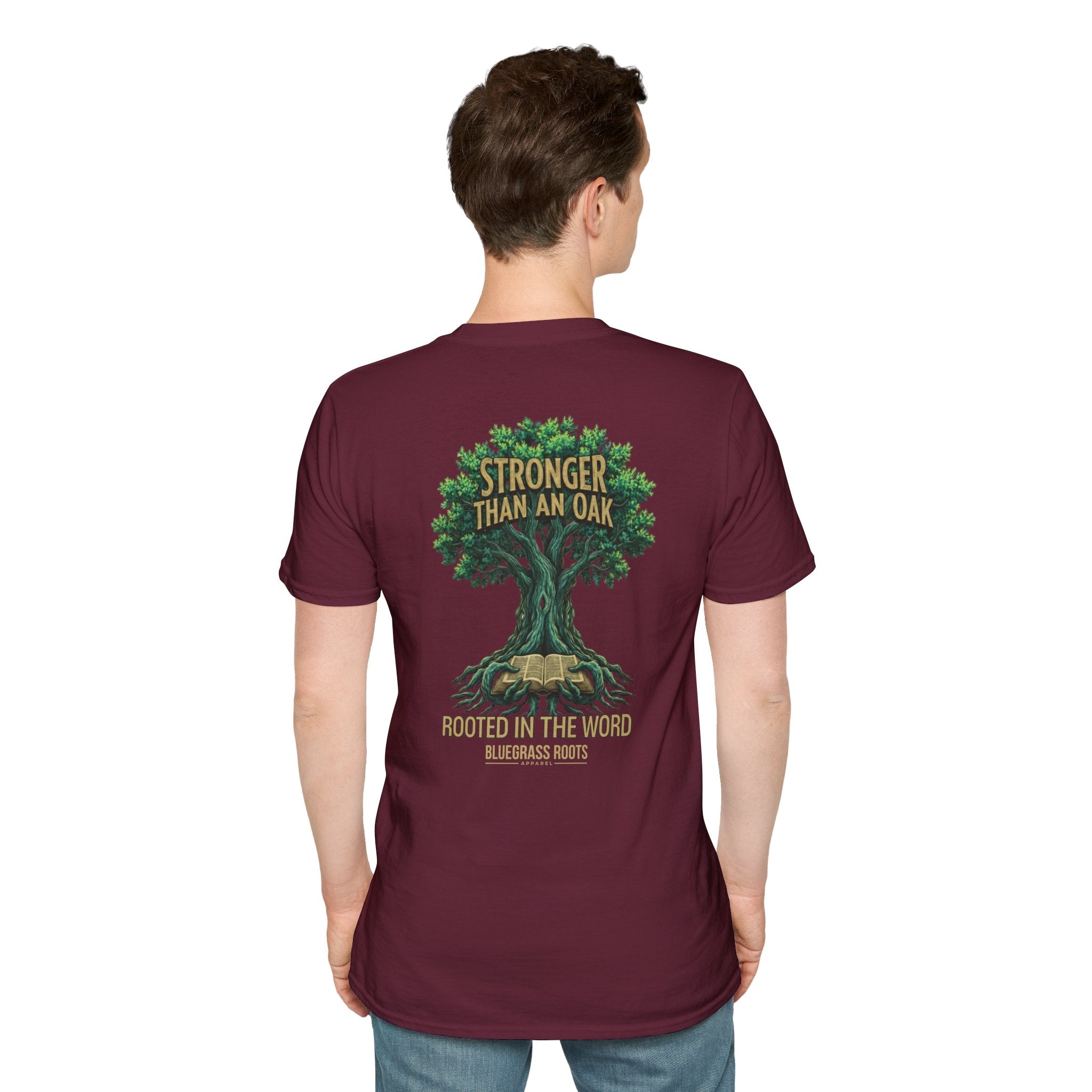 Person wearing a maroon t-shirt with a tree graphic and text on the back, on a white background