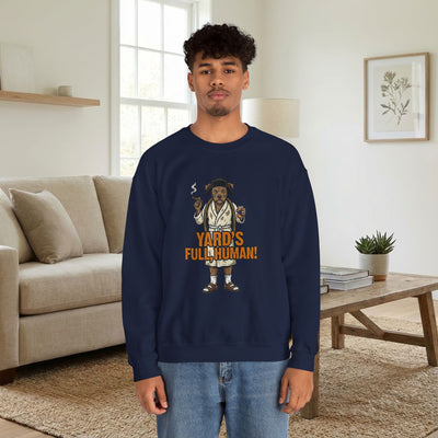 Person wearing a navy blue sweatshirt with a graphic design in a living room.