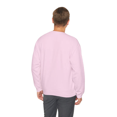 Person wearing a light pink sweatshirt on a white background