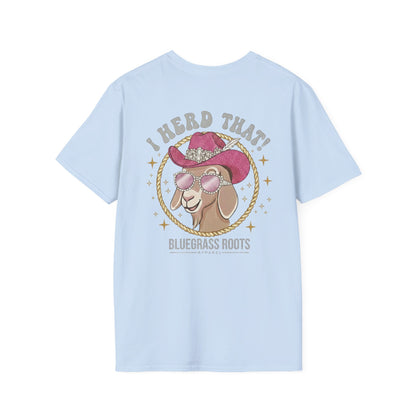Light blue t-shirt with a graphic of a goat wearing a cowboy hat and sunglasses, text 'I Heard That! Bluegrass Roots' on a white background.
