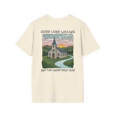 Beige t-shirt with a graphic of a church and landscape on a white background