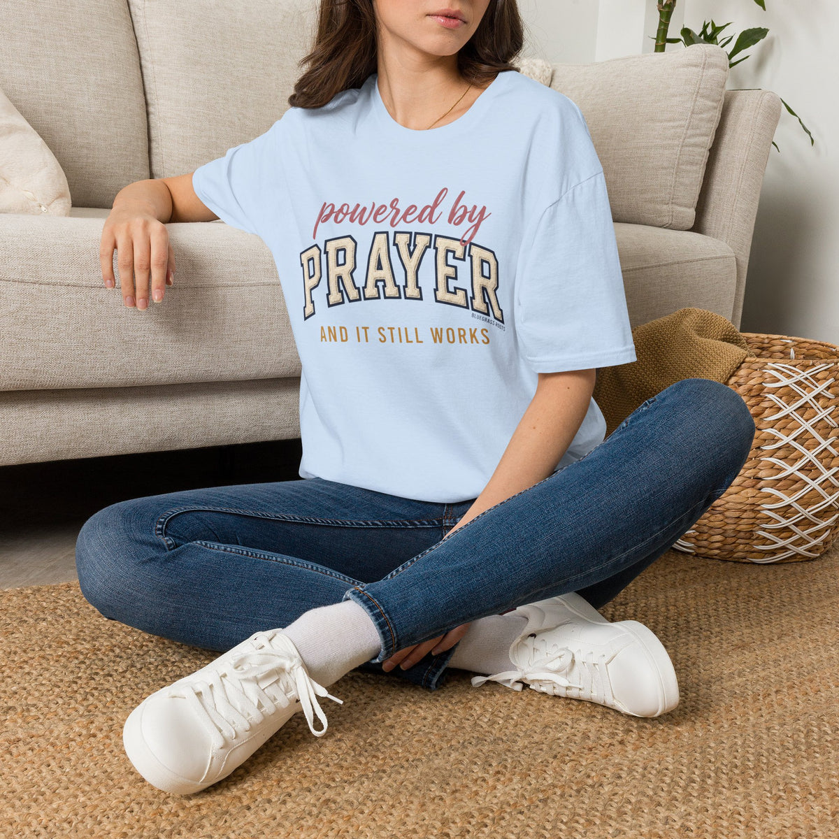 Powered by Prayer varsity shirt