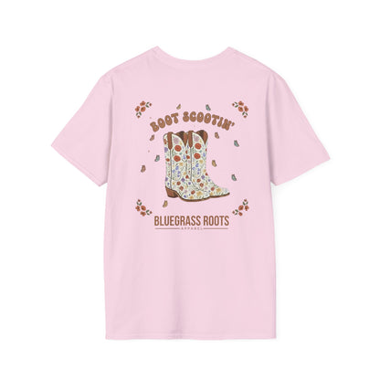 Pink t-shirt with a cowboy boot graphic and text on a white background