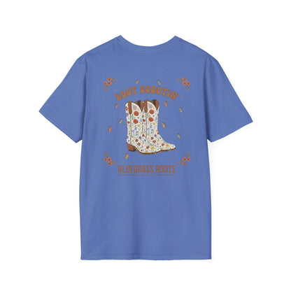 Blue t-shirt with a graphic of cowboy boots and text on the back, on a white background