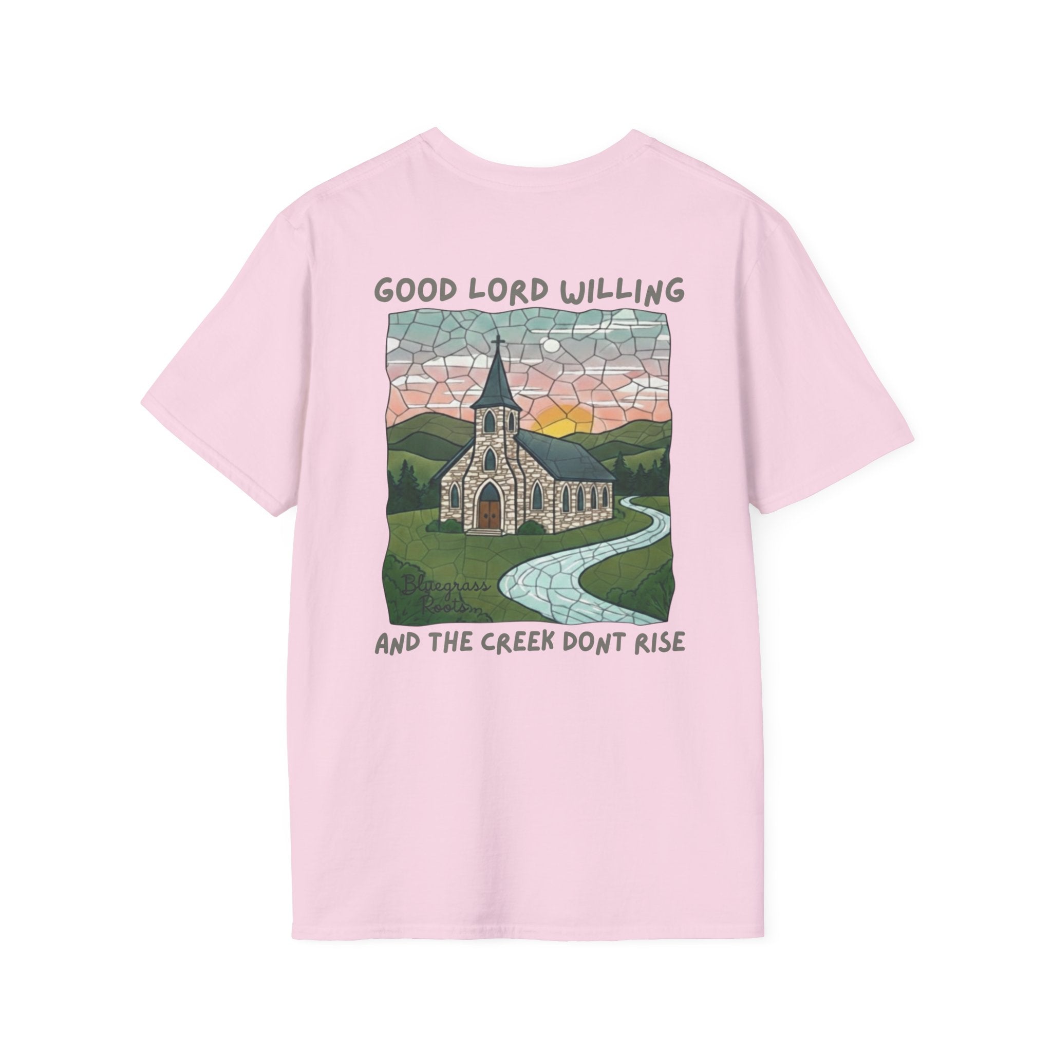 Pink t-shirt with a graphic of a church and landscape, text 'Good Lord Willing' and 'And the creek don't rise'.