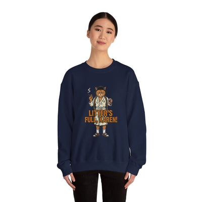 Person wearing a navy blue sweatshirt with a cat graphic and text on a white background