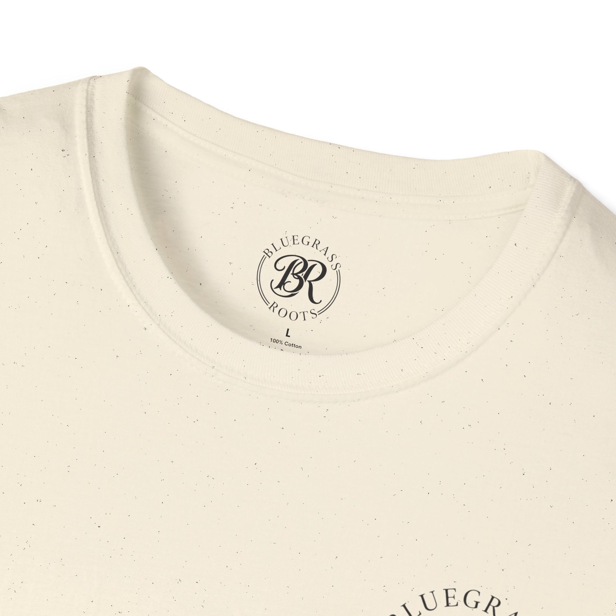 Close-up of a beige t-shirt with 'Bluegrass Roots' logo on a white background