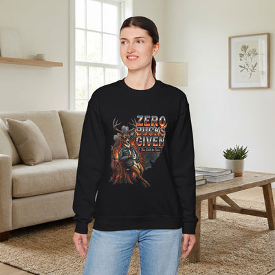 Woman wearing a black sweatshirt with a graphic design in a living room.
