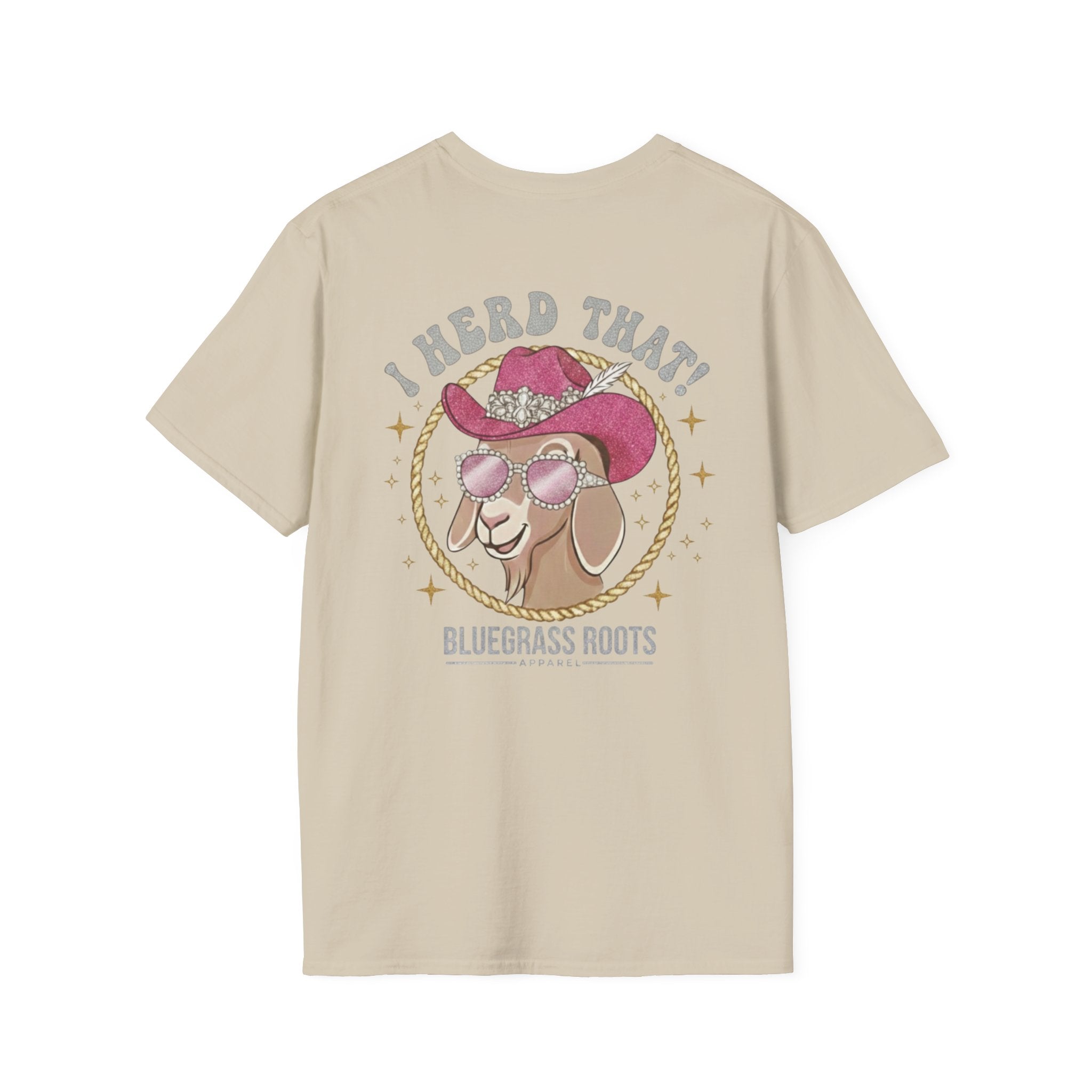 Beige t-shirt with a graphic of a goat wearing a cowboy hat and sunglasses, text 'I Heard That! Bluegrass Roots' on a white background.