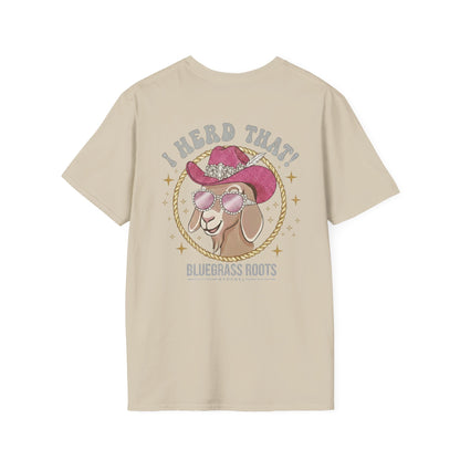 Beige t-shirt with a graphic of a goat wearing a cowboy hat and sunglasses, text 'I Heard That! Bluegrass Roots' on a white background.