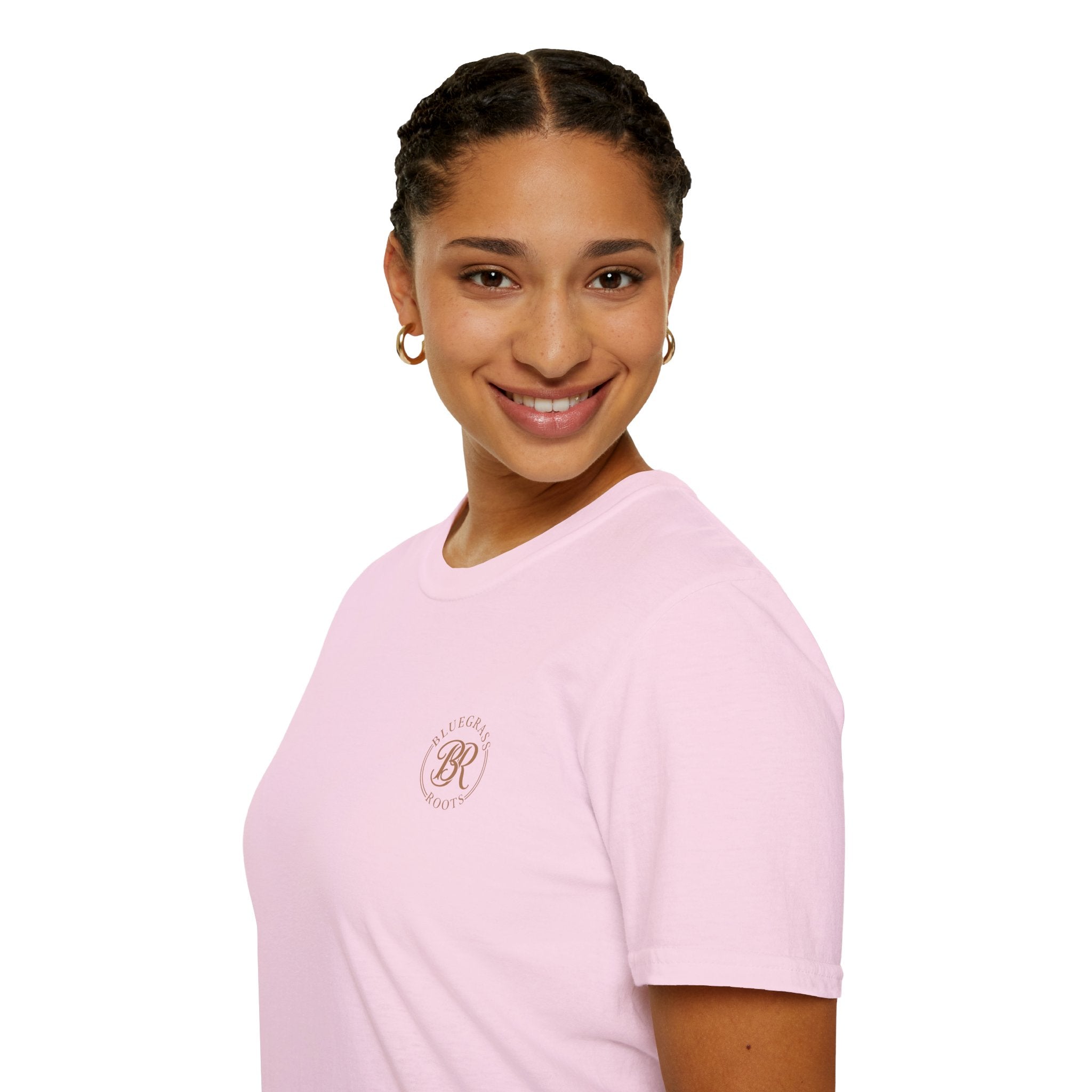 Person wearing a pink t-shirt with a logo on a white background