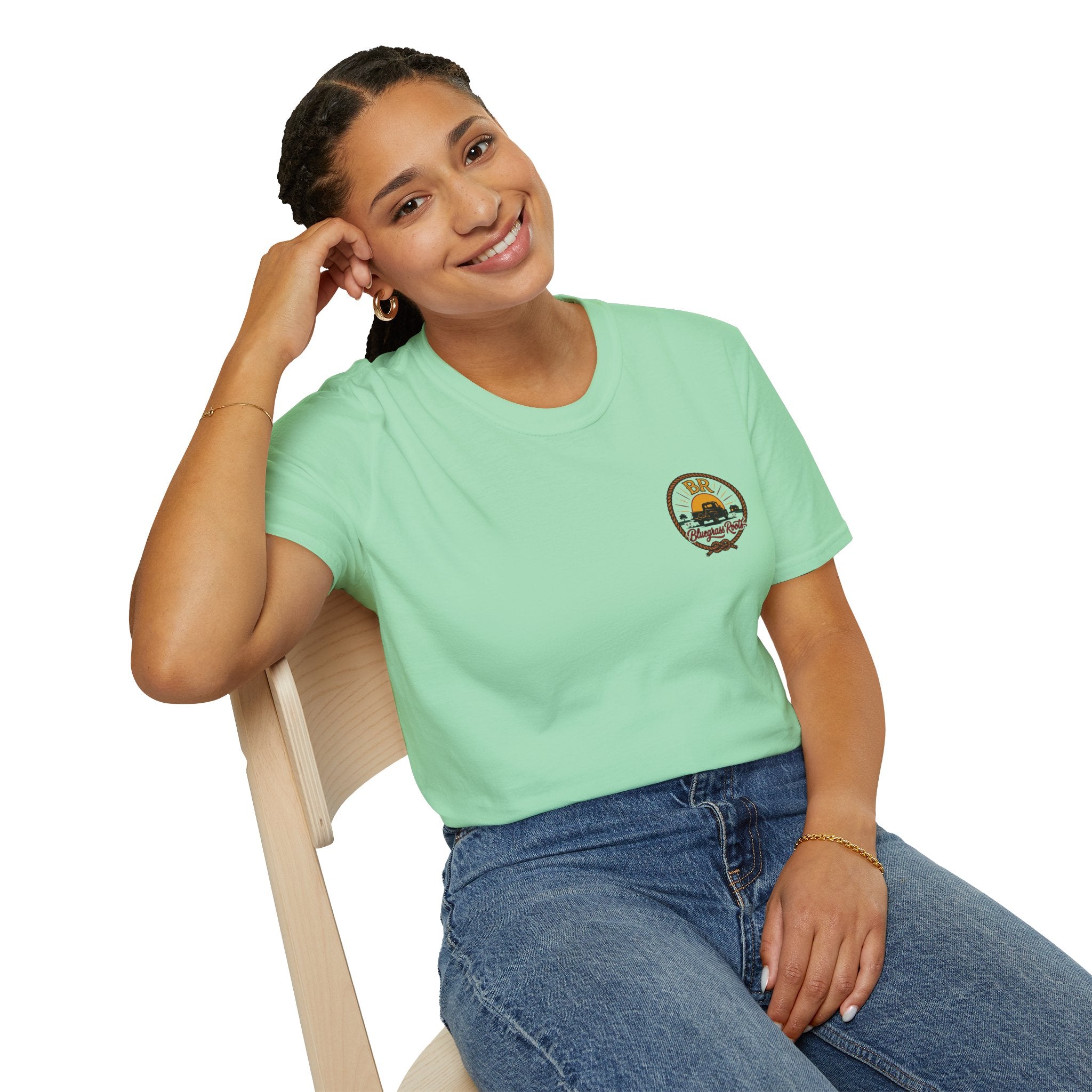 Woman wearing the Bluegrass Roots Raised Right Ran Wild Came Home sunset tailgate tee, casual lifestyle pose